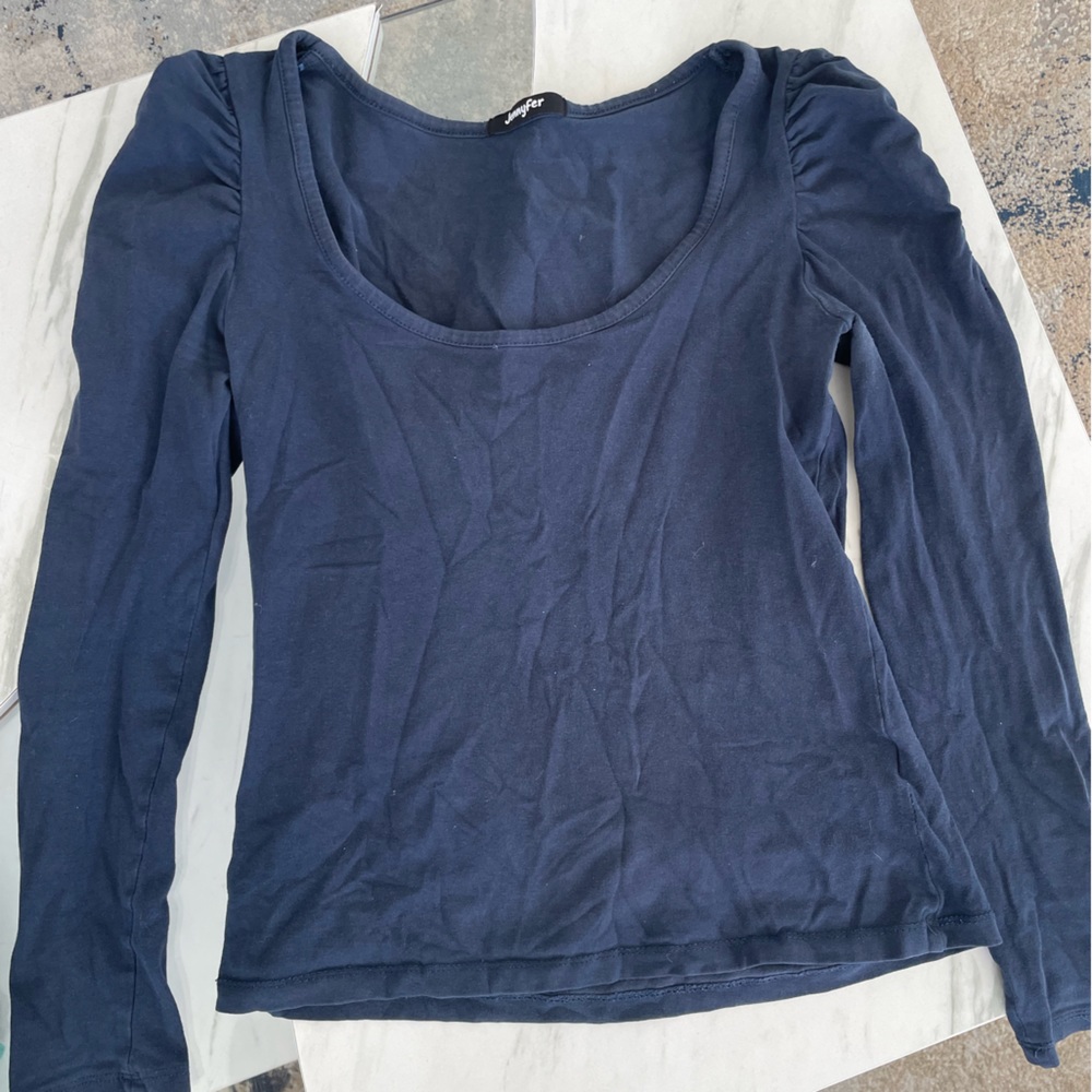 Beautiful top with volume on the shoulders